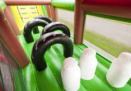 Farm themed inflatable unique 17 meter wide obstacle course with 7 game elements and colorful objects to buy for children. Order inflatable obstacle courses now online at JB Inflatables America