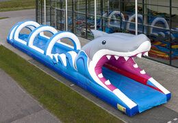Buy inflatable belly slide 18 meters long, shark themed for children. Order inflatable slides now online at JB Inflatables America