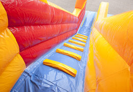 Buy a spectacular clown themed inflatable slide with fun prints for kids. Order inflatable slides now online at JB Inflatables America