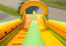 Buy a spectacular jungle-themed inflatable slide with fun prints for kids. Order inflatable slides now online at JB Inflatables America