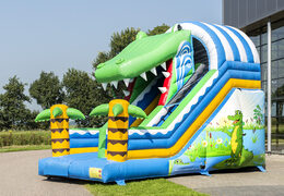 Spectacular inflatable slide in a crocodile theme with cheerful colors for children. Buy inflatable slides now online at JB Inflatables America