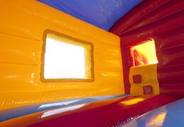 Buy an inflatable indoor maxi multifun bounce house in a clown theme with slide for kids. Order bounce houses online at JB Inflatables America