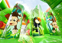 Multiplay safari gorilla bouncer with a slide, fun objects on the jumping surface and eye-catching 3D objects for kids. Order inflatable bouncers online at JB Inflatables America