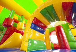 Medium inflatable multiplay bouncer with slide in crocodile theme for children. Order inflatable bouncers online at JB Inflatables America