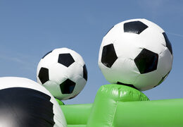 Football themed bouncy castle with slide, fun objects on the jumping surface and striking 3D objects for children. Buy inflatable bouncy castles online at JB Inflatables America