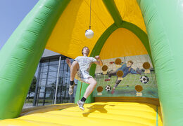 Order a soccer kick arena attraction suitable for young and old, large and small. Buy inflatable soccer kick arena attraction online now at JB Inflatables America