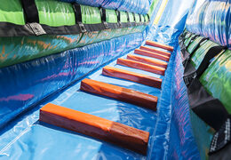 Buy a spectacular surf-themed inflatable slide with fun prints for kids. Order inflatable slides now online at JB Inflatables America