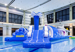 Buy a 13 meter long inflatable shark run assault course in a unique design with funny 3D objects and no less than 2 slides for both young and old. Order inflatable water attractions now online at JB Inflatables America