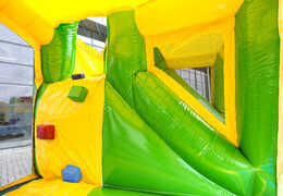 Multiplay Happy jungle bouncer with a slide for children. Buy inflatable bouncers online at JB Inflatables America