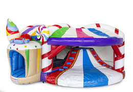 Buy inflatable indoor multiplay bounce house with slide in candyland theme for children. Order inflatable bounce houses online at JB Inflatables America