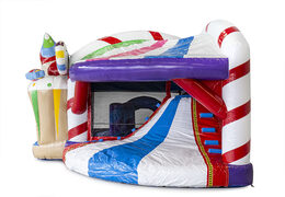 Bounce house in candyland theme with a slide for children. Buy inflatable bounce houses online at JB Inflatables America
