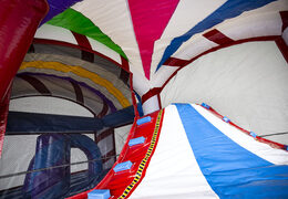 Buy indoor inflatable multiplay bouncer with slide in candyland theme for kids. Order inflatable bouncers online at JB Inflatables America