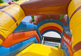 Buy inflatable indoor multiplay bounce house with slide in pirate ship theme for children. Order inflatable bounce houses online at JB Inflatables America