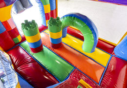 Buy indoor inflatable multiplay bouncer with slide in Lego theme for kids. Order inflatable bouncers online at JB Inflatables America