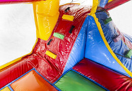 Superblocks themed bounce house with slide and with 3D objects inside for kids. Buy inflatable bounce houses online at JB Inflatables America