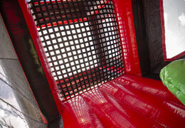 Order an inflatable 40 meter long red black mega alligator obstacle course. Buy inflatable obstacle courses online now at JB Promotions America