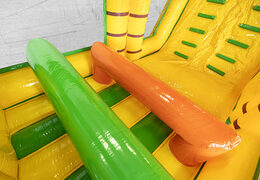 Obstacle course 13.5 meters long in a jungle theme with appropriate 3D objects for children. Order inflatable obstacle courses now online at JB Inflatables America