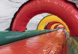 Order Dinopark rollerslide for both young and old. Buy inflatable roller track now online at JB Promotions America