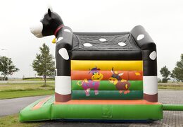 Buy a standard bouncers for children in striking colors with a large 3D object in the shape of a cow on top. Order bouncers online at JB Inflatables America