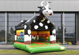 Order a standard bouncer in striking colors with a large 3D object of a cow on top for children. Order bouncers online at JB Inflatables America