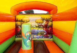 Mini roofed bounce house yellow and green in dinosaur theme to buy for kids. Bounce houses available at JB Inflatables America online