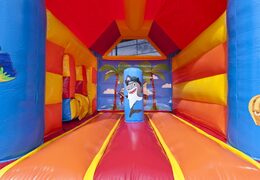 Puchase a midi multifun bounce house in pirate theme with roof for kids. Buy bounce houses at JB Inflatables America online