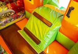 Mini commercial use multifun bounce house with slide green and orange for sale at JB Inflatables America online