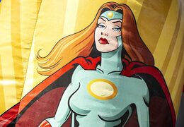 Order a mini multifun bounce house with roof in superhero theme for kids. Buy bounce houses online at JB Inflatables America