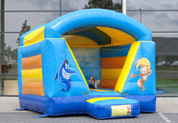 Small bouncy castle with roof for kids to buy in blue and yellow seaworld theme. Bouncy castles available at JB Inflatables America online