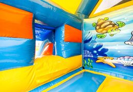 Purchase a midi multifun inflatable bounce house with roof in a color combination of blue yellow and orange in seaworld theme for kids. Buy bounce house online at JB Inflatables America