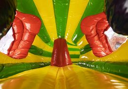 Buy a covered crawl tunnel bouncer in the gorilla theme with obstacles, a climbing slope and a slide for children. Order bouncers online at JB Inflatables America 