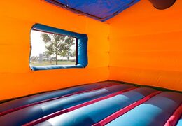Ball pit circus bouncer with a 3D object on the roof and fun pictures on the walls. Order bouncers online at JB Inflatables America 