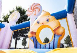 Get a big candyland themed inflatable bouncer with multiple slides and all sorts of fun obstacles with themed prints for kids. Order bouncers online at JB Inflatables America