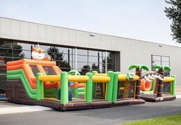 Bounce World jungle bouncy castle with multiple slides and all kinds of fun obstacles with jungle prints for children. Buy bouncy castles online at JB Inflatables America