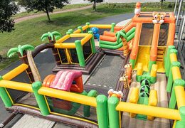 Buy a jungle bounce house with slides, obstacles and fun jungle-themed prints for kids. Order bounce houses online at JB Inflatables America