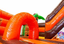 Bounce house in pirate theme with a slide, buy the 3D object on the jumping surface with some fun pirate design for children. Buy bounce houses online at JB Inflatables America 