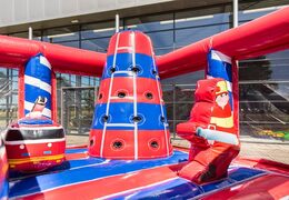 Buy a large Indoor fire brigade bounce house with a slide on the jumping surface, climbing tower and fun obstacles with fire-themed prints for kids. Order inflatable bounce houses online at JB Inflatables America .