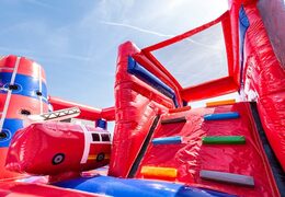 Order a covered multiplay fire brigade bouncer in a limited height of 2.74 meters and with a slide for both old and young. Buy bouncers online at JB Inflatables America 