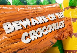 Buy play and fun crocodile crawl tunnel bounce house for children. Order bounce houses online at JB Inflatables America 