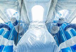 Buy Ice themed bouncer in a unique design with two entrances, a slide in the middle and 3D objects for kids. Order bouncers online at JB Inflatables America 