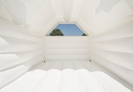 Order standard bounce houses in a wedding theme in the shape of a children's castle. Order bouncy castles online at JB Inflatables America