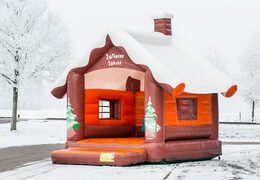 Skihut winterworld bouncer with a 3D chimney at the top for children. Buy bouncers online at JB Inflatables America