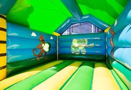 Buy a standard jungle bounce houses in striking colors with a large 3D gorilla object on the top for children . Buy bounce houses online at JB Inflatables America