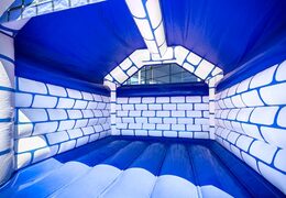 Buy standard blue castle bouncy castles with a knight theme for kids. Buy bouncy castles online at JB Inflatables America