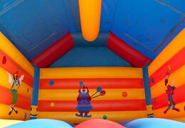 Big inflatable bounce house with roof in clown theme to buy for kids. Order bounce houses online at JB Inflatables America 