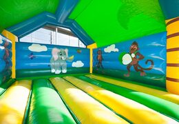Big super bouncer covered with cheerful animations in jungle theme for children. Order bouncers online at JB Inflatables America 