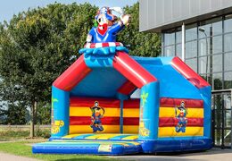 Super bounce house with roof in pirate theme for kids. Buy bounce houses online at JB Inflatables America