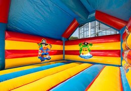 Big super bouncer covered with cheerful animations in pirate theme for children. Order bouncers online at JB Inflatables America 