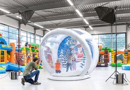 Order inflatable airtight XL snow globe for both young and old. Buy inflatable winter attractions online now at JB Inflatables America