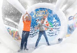Buy an airtight inflatable XL snow globe for both young and old. Order inflatable winter attractions now online at JB Inflatables America